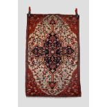 Saruk rug with ivory field, north west Persia, late 19th century, 4ft. 3in. X 2ft. 9in. 1.30m. X 0.