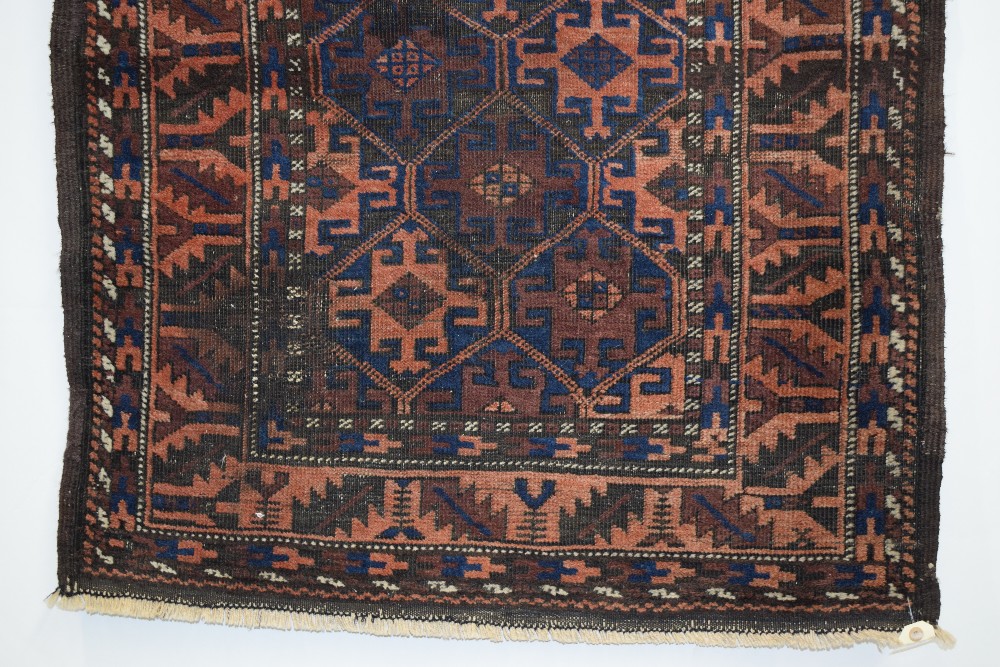 Baluchi rug, Khorasan, north east Persia, early 20th century, 4ft. 10in. x 2ft. 10in. 1.47m. x 0. - Image 7 of 10