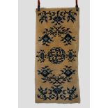 Suiyuan rug, north west China, circa 1920s, 4ft. 7in. x 2ft. 2in. 1.40m. X 0.66m. Pale yellow/