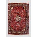 Bijar rug, north west Persia, second half 20th century, 5ft. 4in. X 3ft. 7in. 1.63m. X 1.09m. Red