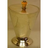 Charles Boyton. An art deco silver tea caddy, the funnel shaped hammered body with a detachable lid,