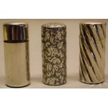 Sampson Morden & Co. Three Victorian silver cylindrical perfume bottles, one swirl fluted, one