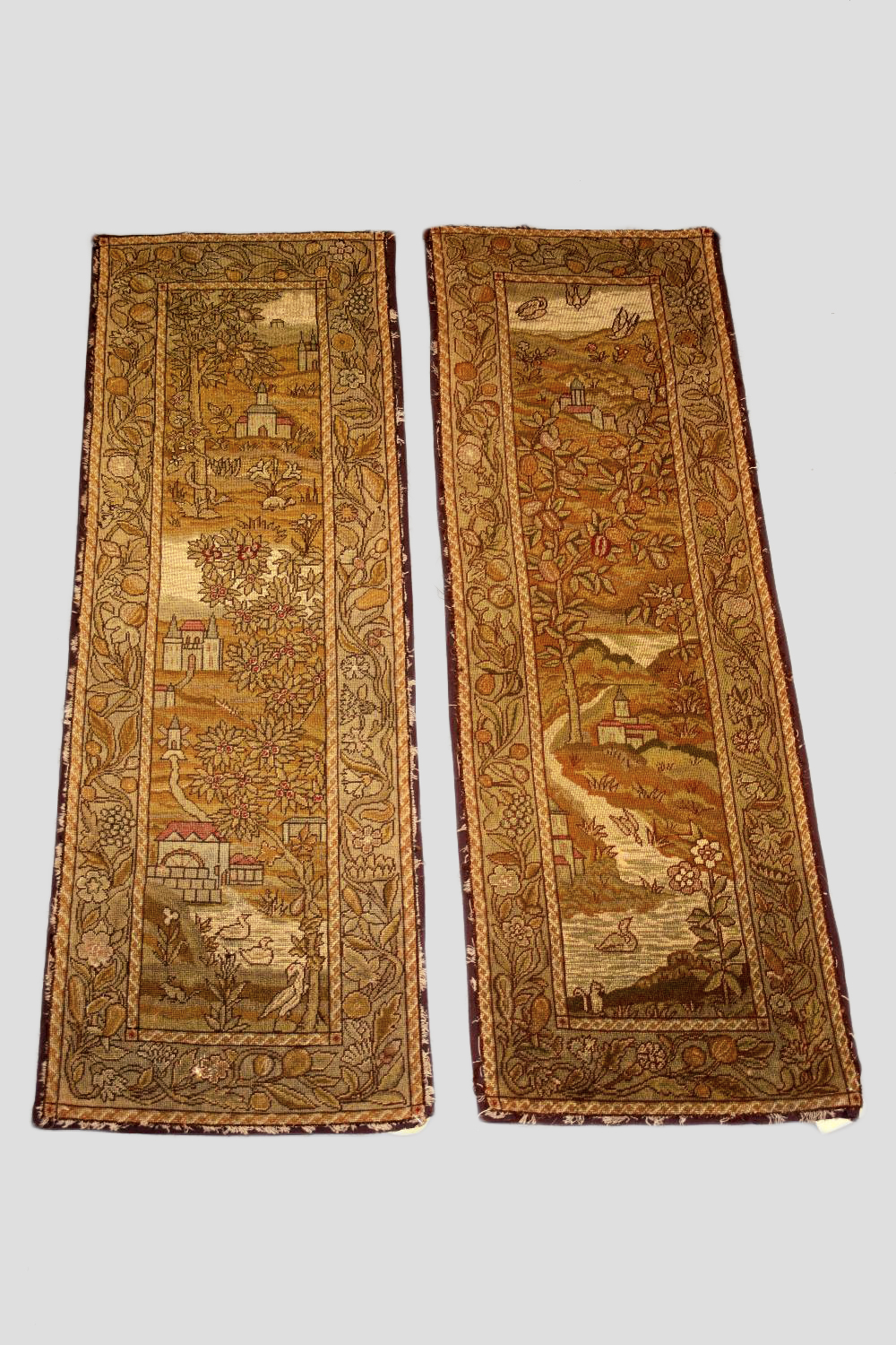 Pair of English needlework hangings, early 19th century, each 60in. X 19in. 152cm. X 48cm. Worked in