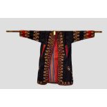 Turkmen silk embroidered black silk chyrpy (robe), Turkmenistan, first half 20th century.