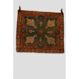 Amritsar rug, north India, early 20th century, 4ft. 4in. X 3ft. 8in. 1.32m. X 1.12m. Slight wear