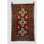 Hamadan rug, north west Persia, dated 1379 (AH) [1937 AD] 6ft. 7in. X 4ft. 2.01m. X 1.22m. Overall