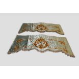 Pair of French pale blue satin pelmets, second half 19th century, 66in. X 29in. 168cm. X 74cm.