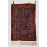 Baluchi prayer rug, Afghanistan, mid-20th century, 4ft. 4in. X 2ft. 10in. 1.32m. X 0.86m. The mid-