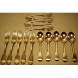 A part set of late Victorian silver fiddle pattern cutlery, engraved an initial, comprising:- five