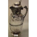 A fine late Victorian silver and glass claret, the body decorated with cutting in rock crystal