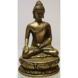 A Burmese silvered bronze Buddha, seated on a lotus throne, 5in (13cm)