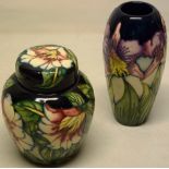 A modern Moorcroft pottery iris vase, 7.5in (19cm) and hibiscus ginger jar and cover, 6.25in (