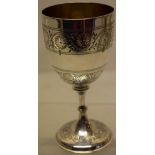 A Victorian silver wine goblet, the bowl engraved bands of trailing florets, gilded inside, on a