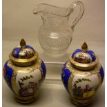 A pair of late nineteenth century German porcelain vases, with covers, painted scenes of courting