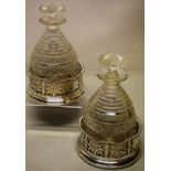 A pair of late Victorian cut glass decanters, with mushroom stoppers, 9.5in (24cm) together with a