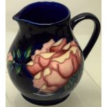 A modern Moorcroft blossom ginger jar and cover, Gustavia Augusta, 6.25in (16cm) seconds and a roses