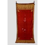 Indian red wool shawl, 19th century, 115in. X 50in. 293cm. X 127cm. The fine red wool centre