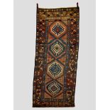 Moghan runner, south east Caucasus, early 20th century, 8ft. 7in. X 3ft. 8in. 2.62m. X 1.12m.