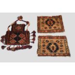 Three north west Persian weavings, comprising a Jaf Kurd salt bag, circa 1930s-50s, Piled face and