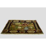 Tabriz pictorial mat, north west Persia, mid-20th century, 1ft. 7in. X 2ft. 8in. 0.48m. X 0.81m. The