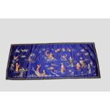 Chinese royal blue silk hanging, early 20th century, 69in. X 31in. 176cm. X 69cm. embroidered in