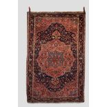 Jozan rug, west Persia, circa 1930s-40s, 6ft. 11in. X 4ft. 6in. 2.11m. X 1.37m. Dark blue field with