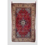 Esfahan rug, central Persia, circa 1930s-40s, 7ft. 3in. X 4ft. 8in. 2.21m. X 1.42m. Red cartouche