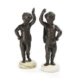 Pair of Continental Patinated Bronze Cherubs