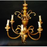 A pair of giltwood and tôle six branch chandelier with turned urnular columns, scrolling branches,