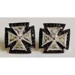 A pair of diamond set Maltese Cross ear studs the triangular diamonds claw set within a border of