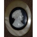 Cameo, 19th century cameo bust of an artist facing right, mounted on black stone,