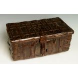 A rare 15th Century iron bound leather covered casket of rectangular form,