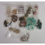 A bag of vintage and modern costume jewellery to include: an agate necklace with matching bracelet;