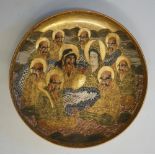 A circular Satsuma pottery plate decorated with the ten immortals and dragon before a stylised