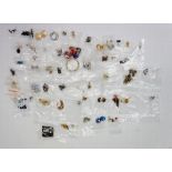 A bag of vintage and modern earrings, both clip on and for pierced ears, to include plastic,