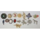 A bag of vintage and modern brooches, to include various jeweled gold tone and silver tone examples,