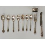 A selection of items to include: a set of six silver? teaspoons with foliate cast designs to stems,