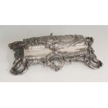 A Palais Royale Rococo style white metal stamp box,