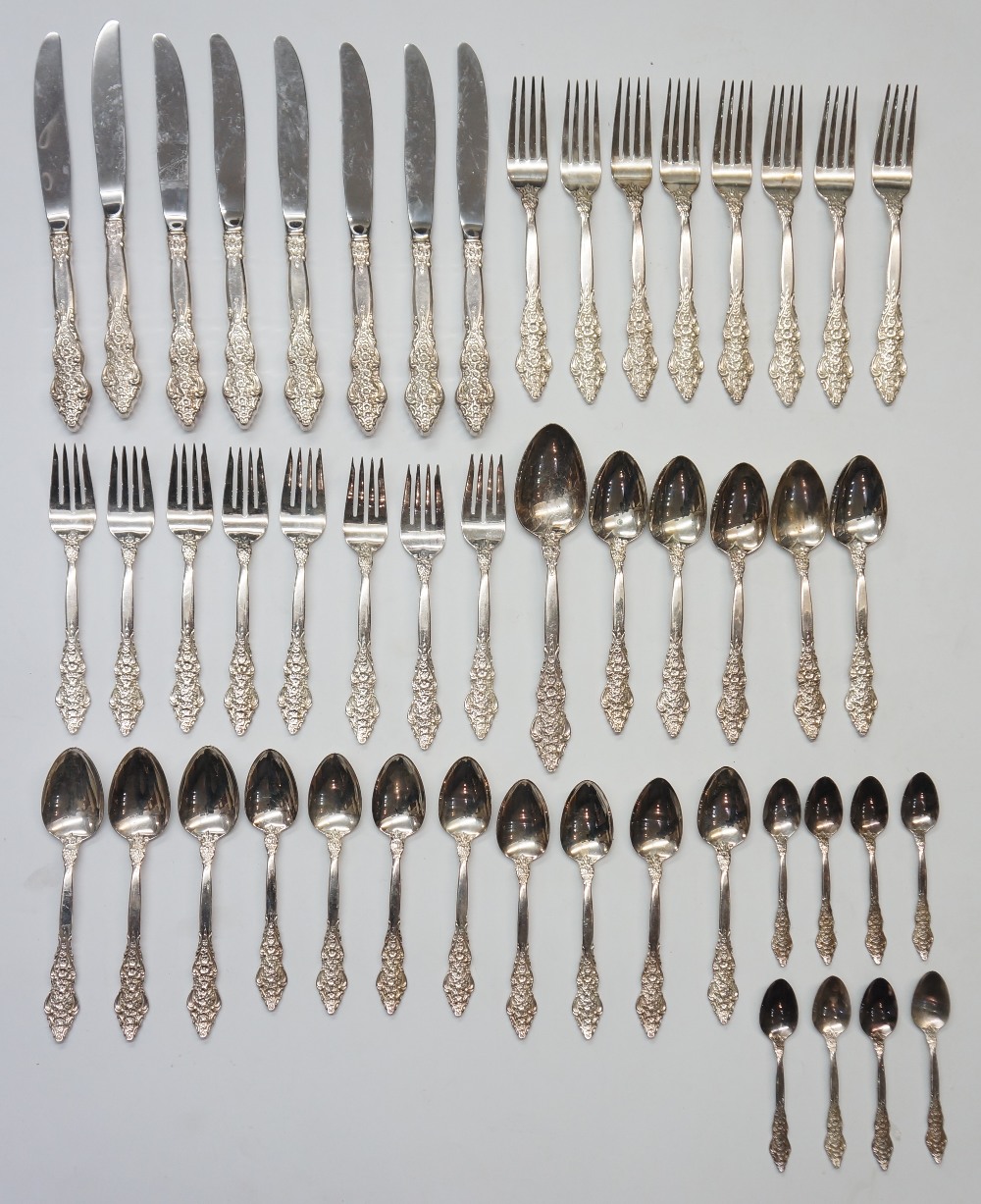 A silver plated canteen of cutlery for eight comprising eight knives, forks, fish forks, spoons,