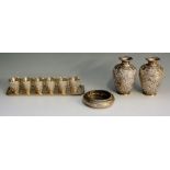 A selection of Indian ? silver coloured metal items to include: a pair of small vases,