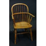 A mid 19th Century ash and elm Windsor chair with railed back,