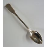 A George III silver basting spoon, fiddle pattern with reeded detailing, engraved crest to terminal,