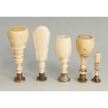 Five 19th Century ivory handled desk seals, variously engraved,