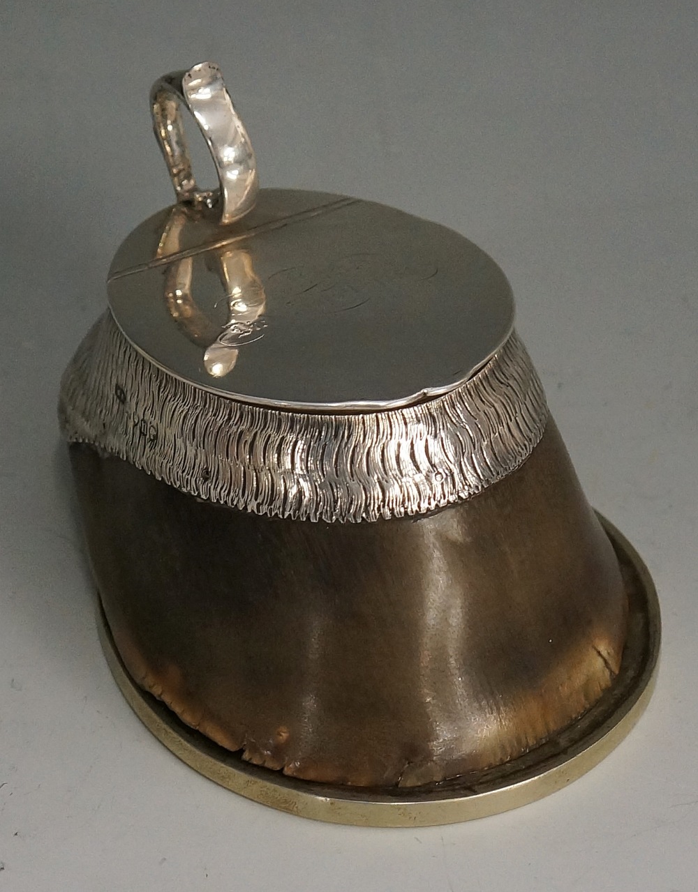 A Victorian silver mounted hoof ink well, the lid with scroll handle and engraved 'Sultan,