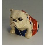 A Royal Doulton British bulldog draped in the Union Jack, 6cm high, printed mark in green ,