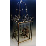 A good late Victorian brass framed rectangular hall lantern the bevelled glazed panels painted with