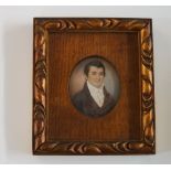 A 19th Century head and shoulder portrait miniature of a gentleman wearing brown coat and white