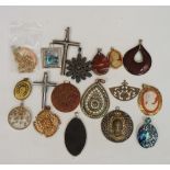 A bag of vintage and modern pendants,