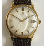 An Omega gentleman's 9ct gold wristwatch, the silver dial with bar numerals and date aperture at 3,