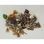 A quantity of gents tie pins, mostly gold tone and silver tone examples, some gem set,
